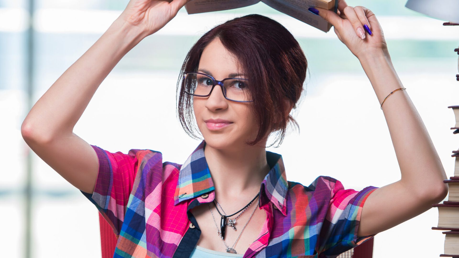 Young female student preparing for exams